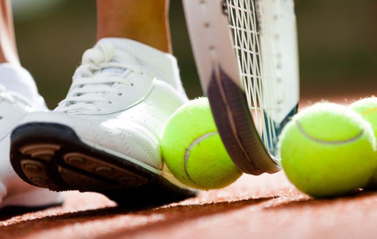 Tennis pro-shop provides tennis equipment, stringing, and ball machine
